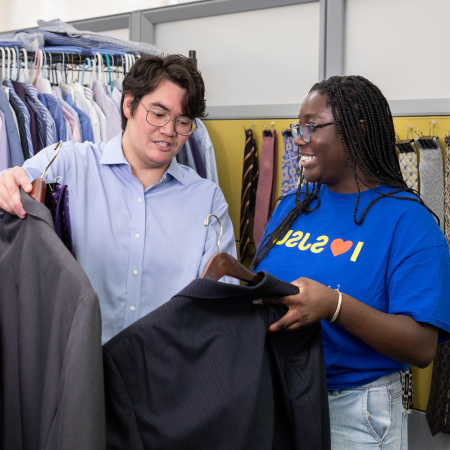 student being helped at the career closet